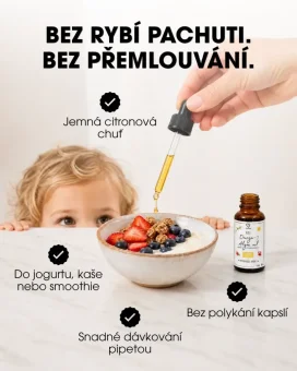 CZ Dítě sleduje dávkování omega-3 oleje z pipety do misky s jogurtem, ovocem a granolou. CZ